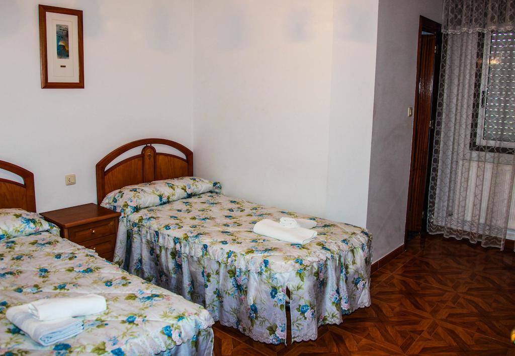 Los Dos Alemanes Melide Rom bilde