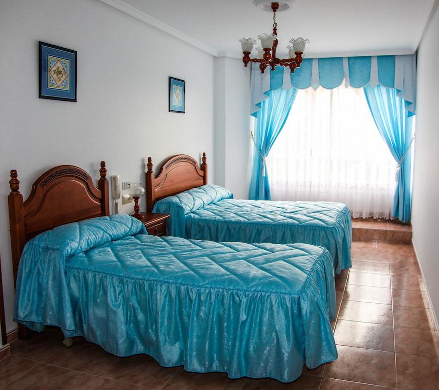 Los Dos Alemanes Melide Rom bilde